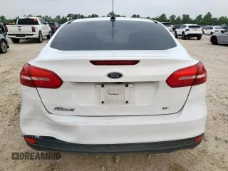 2018 Ford Focus SE with VIN 1FADP3F23JL246375, listed as a Copart auction lot 56539005 with 83,130 mi miles and Salvage title. Bid and sale history available at DreamBid. Image 6.