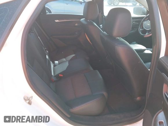 2017 Chevrolet Impala LT with VIN 2G1105S39H9164236, listed as a IAAI auction lot 42001427 with 150,937 mi miles and . Bid and sale history available at DreamBid. Image 7.