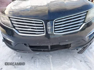 2015 Lincoln MKC with VIN 5LMTJ2AHXFUJ01440, listed as a IAAI auction lot 41526975 with 104,280 mi miles. Bid and sale history available at carsss.com. Image 6.