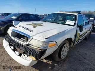 2010 Ford Police Interceptor with VIN 2FABP7BV6AX128399, listed as a IAAI auction lot 41433187 with 196,476 mi miles. Bid and sale history available at carsss.com. Image 23.