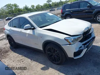 2015 BMW X4 xDrive28i z VIN 5UXXW3C59F0M88331, wystawiony jako IAAI lot #42093953 z przebiegiem 138 205 mil mil oraz . Historia ofert i sprzedaży dostępna na DreamBid. Obrazek 1.