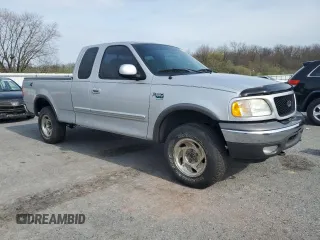 2003 Ford F-150 XL with VIN 1FTRX18L23NA66919, listed as a Copart auction lot 52911285 with 153,870 mi miles and Salvage Title. Bid and sale history available at carsss.com. Image 4.