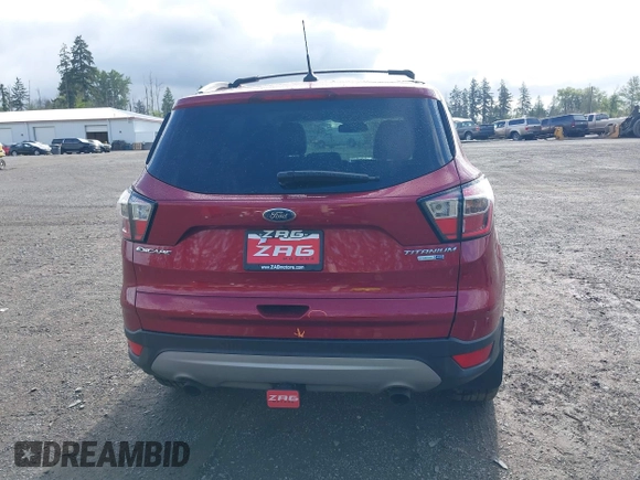 2018 Ford Escape Titanium with VIN 1FMCU9J99JUB44963, listed as a IAAI auction lot 42293113 with 68,803 mi miles and . Bid and sale history available at DreamBid. Image 17.