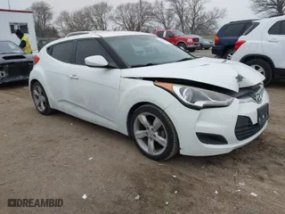 2014 Hyundai Veloster with VIN KMHTC6AD6EU211479, listed as a IAAI auction lot 41196275 with 132,337 mi miles. Bid and sale history available at carsss.com. Image 1.