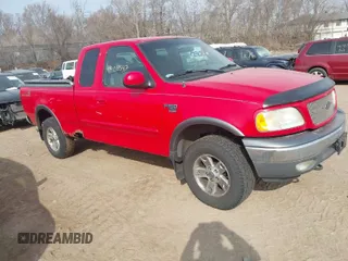 2002 Ford F-150 XL z VIN 1FTRX18L92NA39019, wystawiony jako IAAI lot #41908547 z przebiegiem 127 216 mil mil oraz . Historia ofert i sprzedaży dostępna na DreamBid. Obrazek 1.