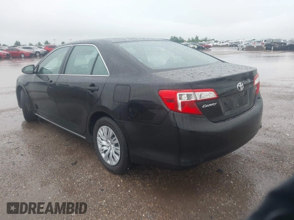 2014 Toyota Camry L with VIN 4T1BF1FK0EU823710, listed as a IAAI auction lot 42153523 with 105,468 mi miles and . Bid and sale history available at DreamBid. Image 3.