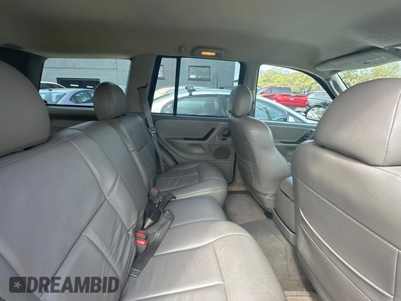 2004 Jeep Grand Cherokee Laredo with VIN 1J4GX48N24C436753, listed as a Copart auction lot 48782585 with 114,035 mi miles and Clean title. Bid and sale history available at DreamBid. Image 6.