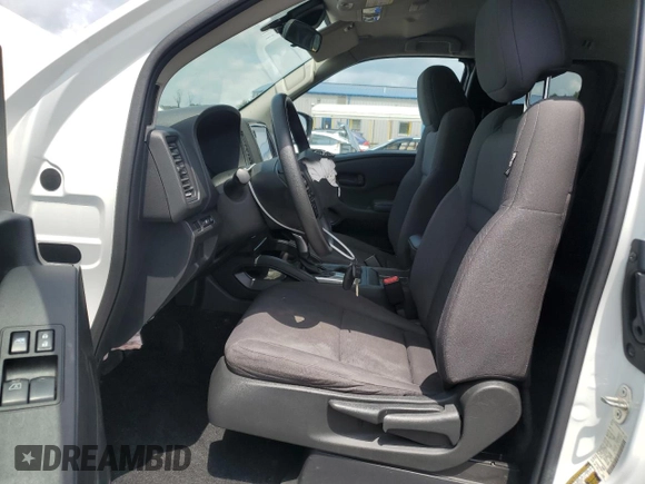 2023 Nissan Frontier S with VIN 1N6ED1CM1PN609767, listed as a Copart auction lot 64793675 with 36,700 mi miles and Salvage title. Bid and sale history available at DreamBid. Image 7.