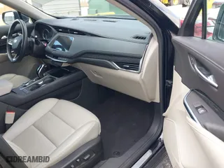 2023 Cadillac XT4 FWD Premium Luxury with VIN 1GYFZCR44PF170452, listed as a IAAI auction lot 42084960 with 22,212 mi miles. Bid and sale history available at carsss.com. Image 5.