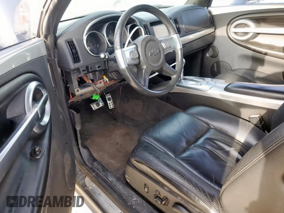 2005 Chevrolet SSR LS z VIN 1GCES14H75B114899, wystawiony jako Copart lot #56712515 z przebiegiem 99 359 mil mil oraz Szkoda całkowita • Salvage title. Historia ofert i sprzedaży dostępna na DreamBid. Obrazek 8.