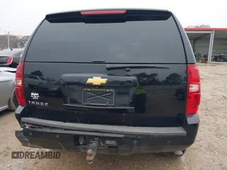 2014 Chevrolet Tahoe LT z VIN 1GNSCBE04ER143872, wystawiony jako IAAI lot #41377204 z przebiegiem 119 533 mil mil oraz . Historia ofert i sprzedaży dostępna na DreamBid. Obrazek 16.