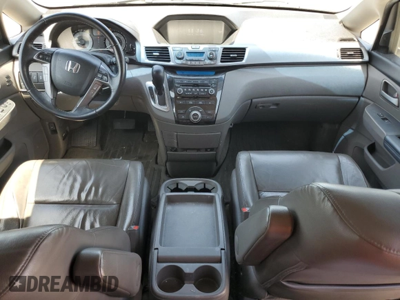 2012 Honda Odyssey Touring с VIN 5FNRL5H9XCB109229, выставлен на аукционе Copart как лот 59885895 с пробегом 153 668 миль миль и Чистый • Clean title. История ставок и продаж доступна на DreamBid. Изображение 8.