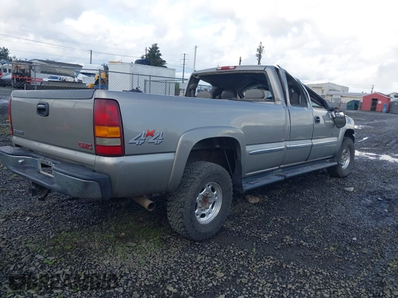 2000 GMC Sierra 2500 SLE z VIN 1GTGK29U7YE380284, wystawiony jako IAAI lot #41965443 z przebiegiem 189 831 mil mil oraz . Historia ofert i sprzedaży dostępna na DreamBid. Obrazek 4.