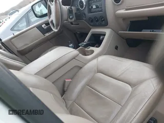 2004 Ford Expedition Special Service with VIN 1FMPU16L64LA70855, listed as a IAAI auction lot 41231282 with 221,560 mi miles. Bid and sale history available at carsss.com. Image 5.