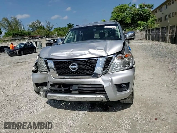 2017 Nissan Armada Platinum z VIN JN8AY2ND0H9008549, wystawiony jako Copart lot #56767515 z przebiegiem 60 152 mil mil oraz Szkoda całkowita • Salvage title. Historia ofert i sprzedaży dostępna na DreamBid. Obrazek 14.