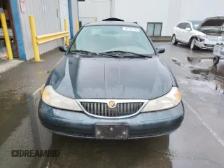 1998 Mercury Mystique z VIN 1MEFM66L5WK667211, wystawiony jako Copart lot #82342784 z przebiegiem 94 102 mil mil oraz Tytuł czysty. Historia ofert i sprzedaży dostępna na DreamBid. Obrazek 5.