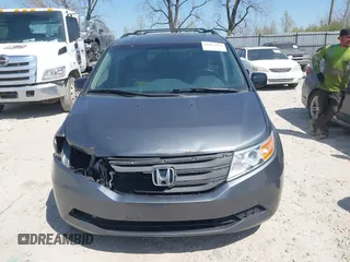 2012 Honda Odyssey EX-L with VIN 5FNRL5H69CB047425, listed as a IAAI auction lot 42064979 with 242,409 mi miles and . Bid and sale history available at carsss.com. Image 13.