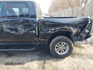 2015 Ram 1500 Big Horn with VIN 1C6RR7LG0FS748282, listed as a IAAI auction lot 41794627 with 163,922 mi miles and . Bid and sale history available at DreamBid. Image 6.