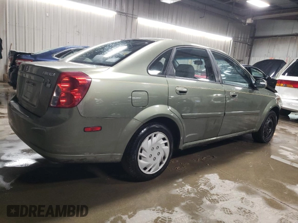 2004 Suzuki Forenza S z VIN KL5JD52Z14K975804, wystawiony jako Copart lot #43227455 z przebiegiem 114 726 mil mil oraz Szkody całkowita. Historia ofert i sprzedaży dostępna na DreamBid. Obrazek 3.