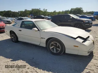 1989 Pontiac Firebird z VIN 1G2FS21S4KL260438, wystawiony jako Copart lot #57420155 z przebiegiem 132 101 mil mil oraz Czysty tytuł • Clean title. Historia ofert i sprzedaży dostępna na DreamBid. Obrazek 5.