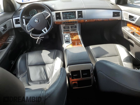 2014 Jaguar XF SC with VIN SAJWA0EX2E8U21886, listed as a Copart auction lot 76783344 with 97,280 mi miles and Salvage Title. Bid and sale history available at DreamBid. Image 8.