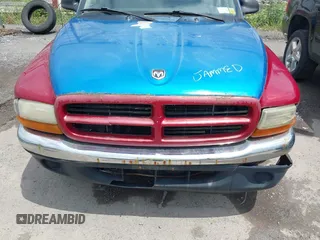 2001 Dodge Dakota Sport z VIN 1B7GL2AN31S115001, wystawiony jako IAAI lot #42452634 z przebiegiem Nie podano mil oraz . Historia ofert i sprzedaży dostępna na DreamBid. Obrazek 6.