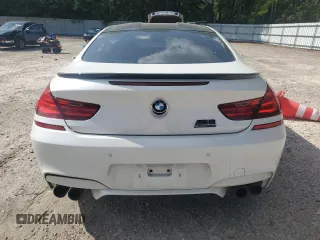 2014 BMW M6 z VIN WBSLX9C51ED160529, wystawiony jako Copart lot #76238844 z przebiegiem 57 557 mil mil oraz Szkoda całkowita • Salvage title. Historia ofert i sprzedaży dostępna na DreamBid. Obrazek 6.