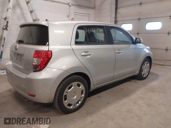 2010 Scion xD with VIN JTKKU4B40AJ057503, listed as a IAAI auction lot 41977965 with 202,538 mi miles. Bid and sale history available at carsss.com. Image 4.