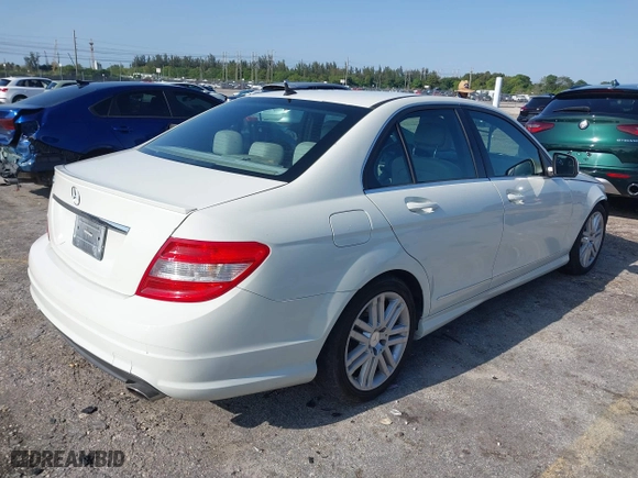 2009 Mercedes-Benz C-Class 3.0L Sport with VIN WDDGF54X99R078597, listed as a IAAI auction lot 41994886 with 238,412 mi miles. Bid and sale history available at carsss.com. Image 4.