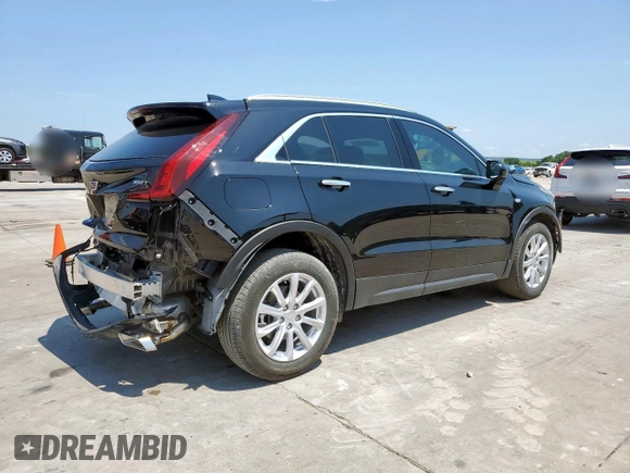 2023 Cadillac XT4 FWD Luxury z VIN 1GYAZAR42PF102696, wystawiony jako Copart lot #60524065 z przebiegiem 1 903 mil mil oraz Szkoda całkowita • Salvage title. Historia ofert i sprzedaży dostępna na DreamBid. Obrazek 3.