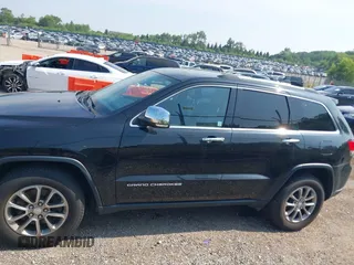 2014 Jeep Grand Cherokee Limited with VIN 1C4RJFBM5EC496734, listed as a IAAI auction lot 42809206 with 68,983 mi miles and . Bid and sale history available at DreamBid. Image 14.