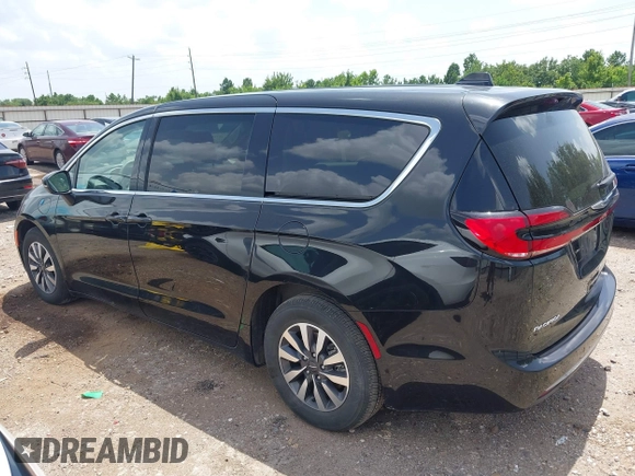 2023 Chrysler Pacifica Hybrid Touring L with VIN 2C4RC1L70PR622000, listed as a IAAI auction lot 42711826 with 65,109 mi miles and . Bid and sale history available at DreamBid. Image 15.