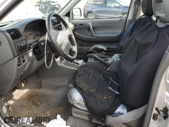 1998 Isuzu Rodeo S z VIN 4S2CK58W9W4302907, wystawiony jako Copart lot #48997335 z przebiegiem 162 858 mil mil oraz Szkoda całkowita • Salvage title. Historia ofert i sprzedaży dostępna na DreamBid. Obrazek 7.