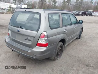 2006 Subaru Forester 2.5 X w/Premium Pkg with VIN JF1SG656X6H705960, listed as a IAAI auction lot 41872470 with 228,095 mi miles. Bid and sale history available at carsss.com. Image 4.