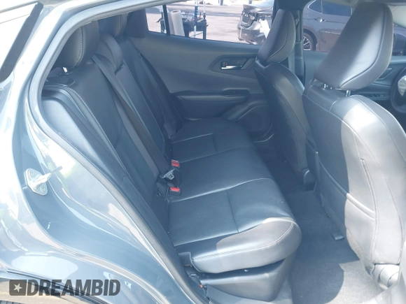 2023 Toyota Prius LE z VIN JTDADABU6P3001399, wystawiony jako IAAI lot #42137395 z przebiegiem 37 716 mil mil oraz . Historia ofert i sprzedaży dostępna na DreamBid. Obrazek 8.