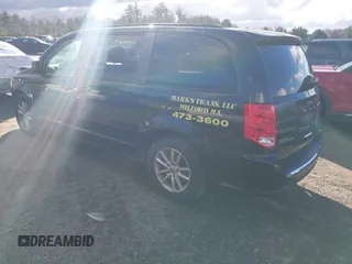 2014 Dodge Grand Caravan SXT with VIN 2C4RDGCG4ER337202, listed as a IAAI auction lot 40781755 with 258,524 mi miles and . Bid and sale history available at DreamBid. Image 3.