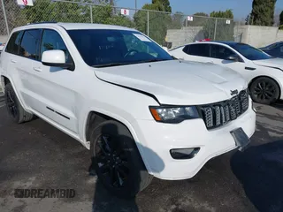 2020 Jeep Grand Cherokee Altitude with VIN 1C4RJEAG2LC306195, listed as a IAAI auction lot 41626392 with 45,587 mi miles and . Bid and sale history available at DreamBid. Image 1.