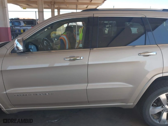 2014 Jeep Grand Cherokee Overland with VIN 1C4RJFCT4EC400565, listed as a IAAI auction lot 41937436 with 56,481 mi miles. Bid and sale history available at carsss.com. Image 13.