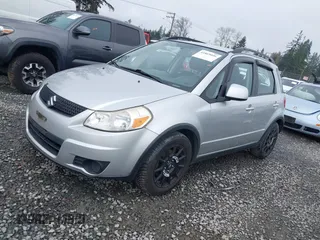 2010 Suzuki SX4 with VIN JS2YB5A3XA6300216, listed as a IAAI auction lot 41869046 with 129,709 mi miles and . Bid and sale history available at DreamBid. Image 2.