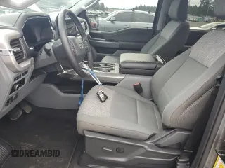 2023 Ford F-150 Lightning Pro with VIN 1FTVW1EL8PWG38419, listed as a Copart auction lot 47630535 with 11,940 mi miles and Salvage Title. Bid and sale history available at DreamBid. Image 7.
