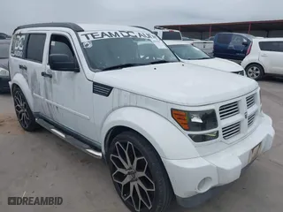 2011 Dodge Nitro Heat with VIN 1D4PT4GK7BW597204, listed as a IAAI auction lot 41919205 with 148,010 mi miles. Bid and sale history available at carsss.com. Image 1.