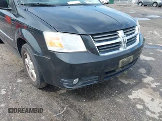 2010 Dodge Grand Caravan SXT with VIN 2D4RN5D11AR459864, listed as a IAAI auction lot 42197818 with 149,553 mi miles and . Bid and sale history available at DreamBid. Image 6.