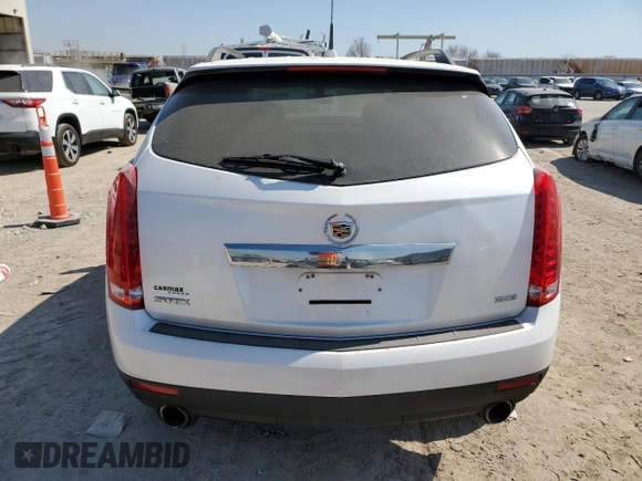 2014 Cadillac SRX with VIN 3GYFNAE32ES667019, listed as a Copart auction lot 49008165 with 98,995 mi miles and Salvage Title. Bid and sale history available at DreamBid. Image 6.