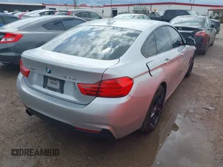 2015 BMW 4 Series 428i xDrive with VIN WBA4C9C50FD330482, listed as a IAAI auction lot 42116547 with 192,739 mi miles and . Bid and sale history available at DreamBid. Image 4.