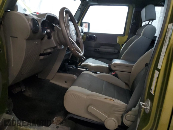 2007 Jeep Wrangler Unlimited X with VIN 1J4GA39187L190061, listed as a Copart auction lot 52420685 with 217,346 mi miles and Salvage Title. Bid and sale history available at DreamBid. Image 7.