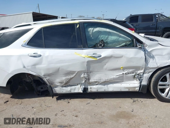 2018 Chevrolet Equinox Premier with VIN 2GNAXWEX3J6141427, listed as a IAAI auction lot 41830179 with 76,707 mi miles and . Bid and sale history available at carsss.com. Image 12.