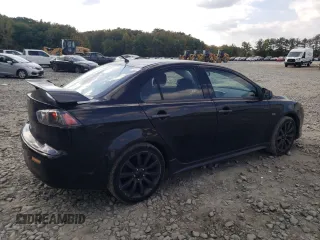 2009 Mitsubishi Lancer GTS with VIN JA3AU86W89U003672, listed as a Copart auction lot 74672874 with 184,000 mi miles and Salvage Title. Bid and sale history available at carsss.com. Image 3.