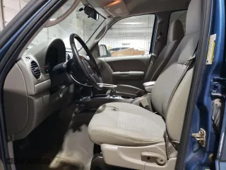 2005 Jeep Liberty Sport with VIN 1J4GL48K55W555396, listed as a Copart auction lot 52388185 with 50,253 mi miles and Salvage Title. Bid and sale history available at carsss.com. Image 7.