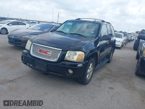 2004 GMC Envoy SLE with VIN 1GKDS13SX42398363, listed as a IAAI auction lot 42154134 with 308,001 mi miles and . Bid and sale history available at DreamBid. Image 2.