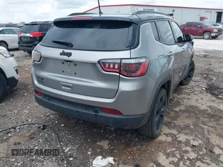 2018 Jeep Compass Latitude with VIN 3C4NJDBB8JT323967, listed as a IAAI auction lot 42096644 with 143,761 mi miles and . Bid and sale history available at DreamBid. Image 4.